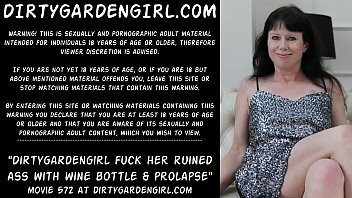 Play Dirtygardengirl fucking her ruined ass with two wine bottles big and bigger. Then prolapse